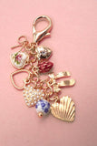 PORCELAIN BOWS HEARTS PEARL STRAWBERRY BAG CHARM