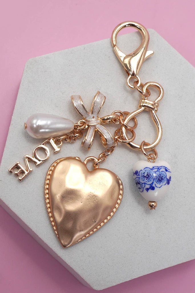 PORCELAIN BOW HEART LOVE BAG CHARM