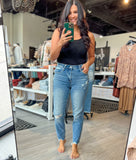 Risen Mid Rise Tapered Jeans