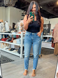 Risen Mid Rise Tapered Jeans